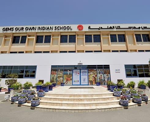 GEMS Our Own Indian School logo